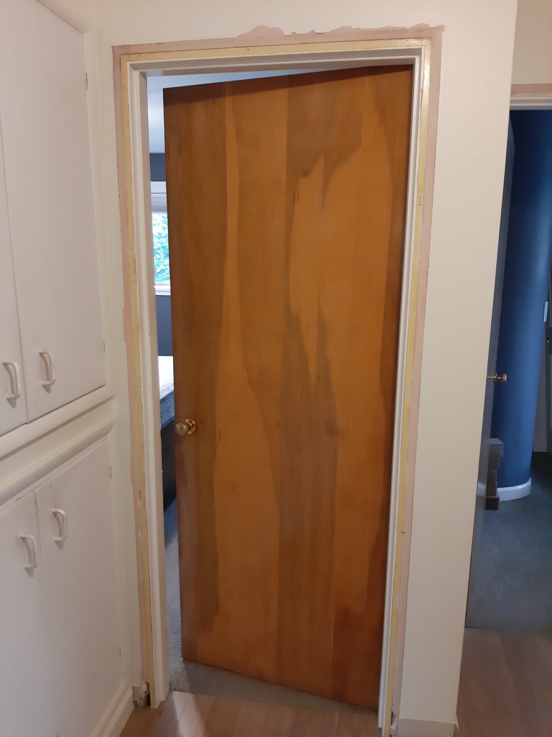 Interior swing door before installation, Seattle home