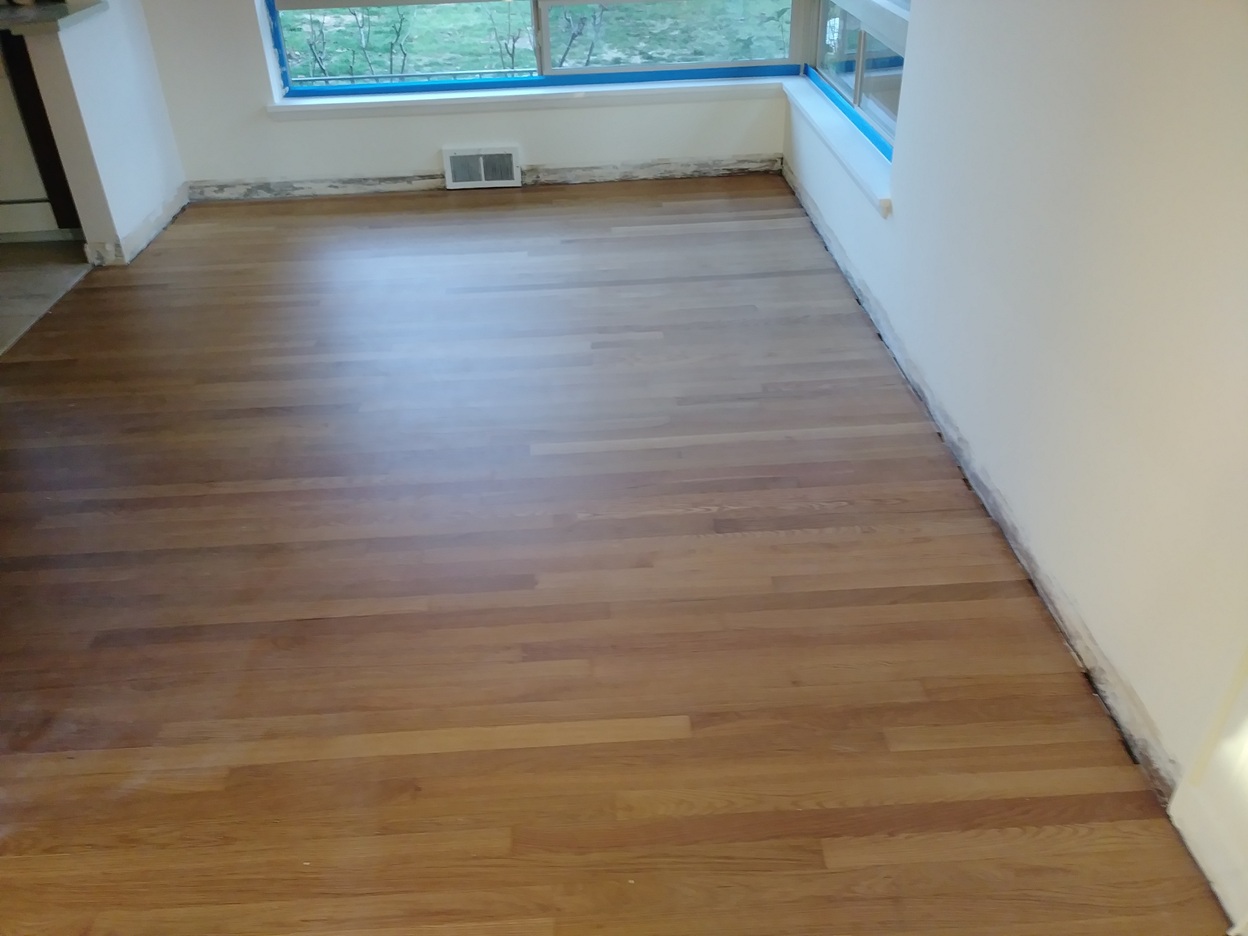 Room corner before baseboard installation, Seattle