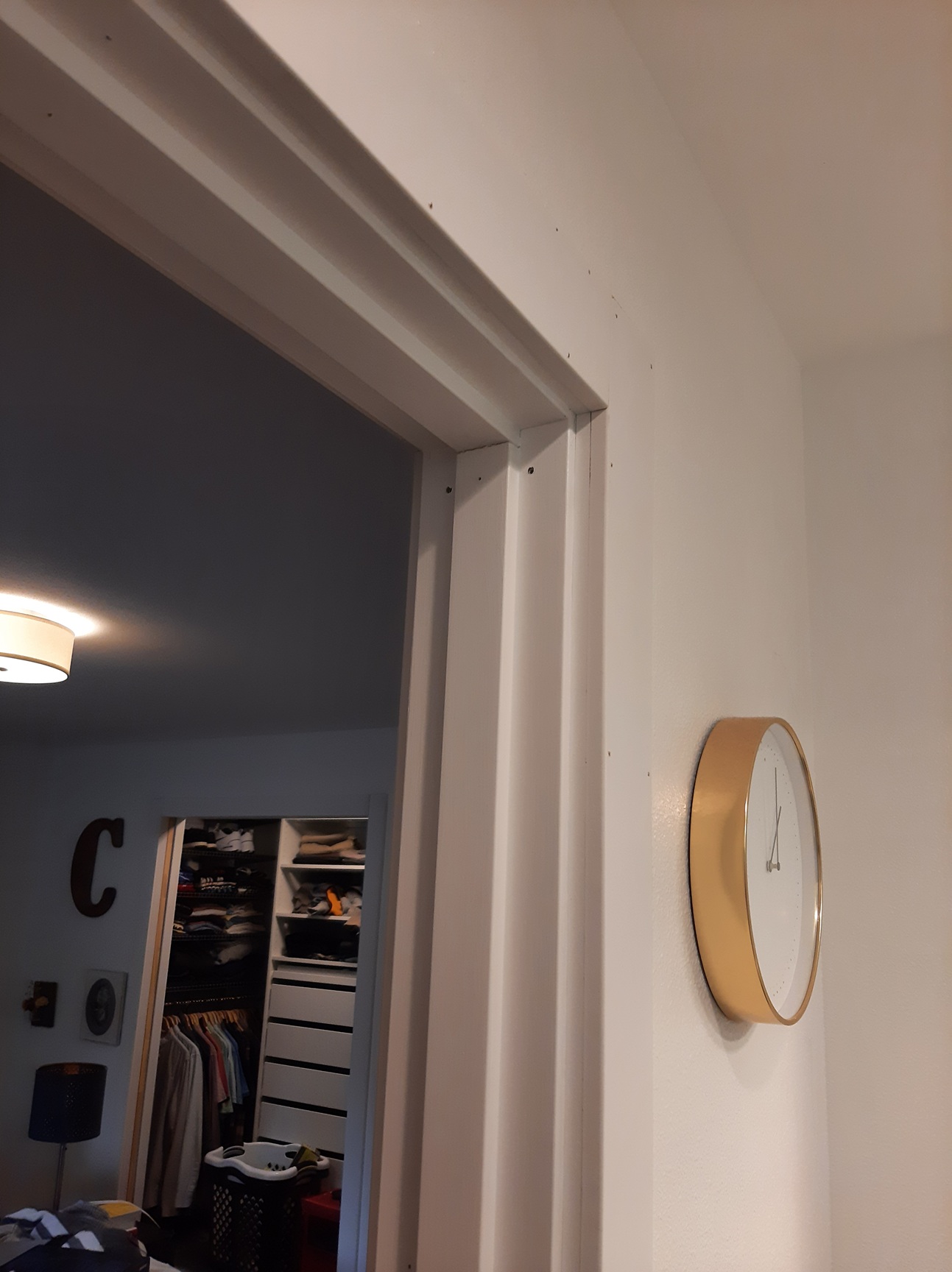 Interior door casing installation in progress, Seattle