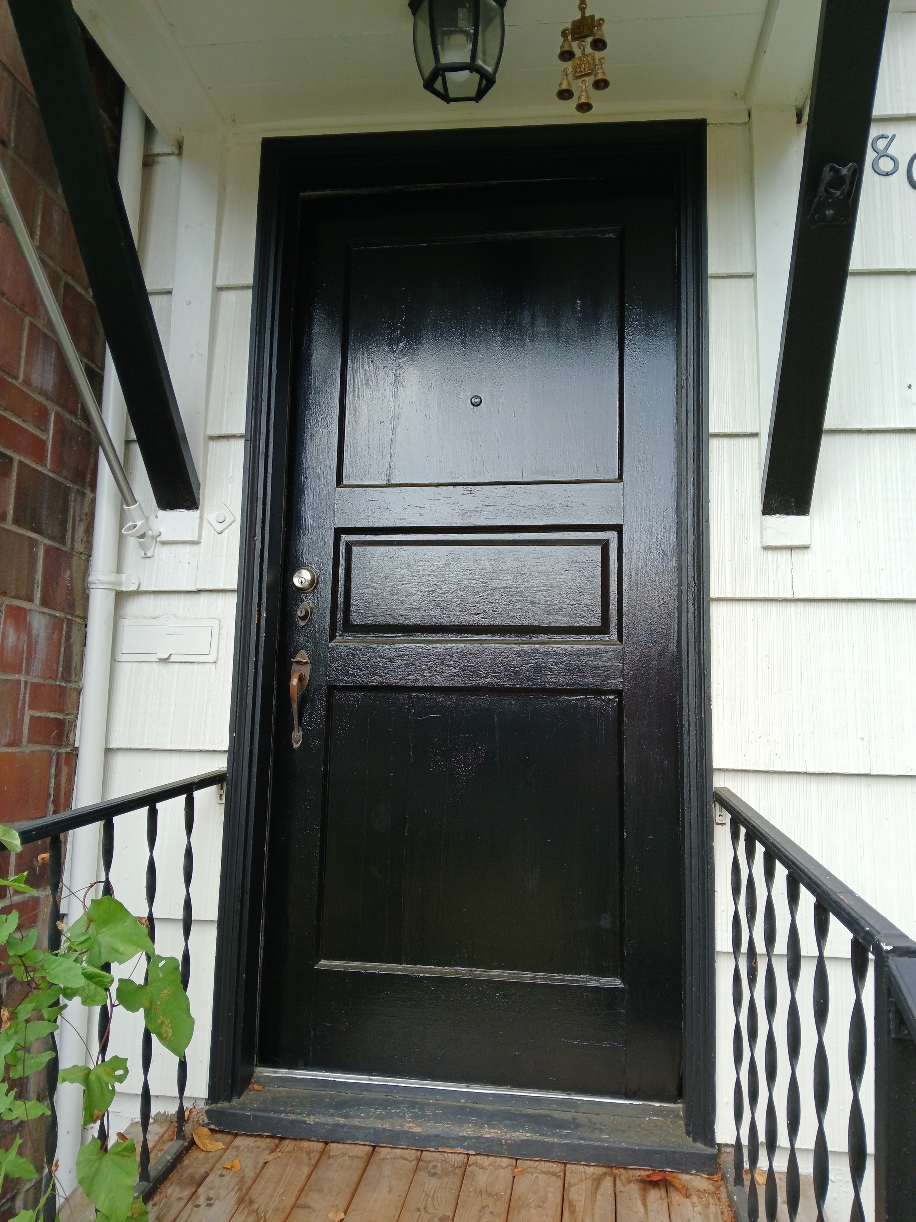 Exterior door before replacement, covered porch, Seattle