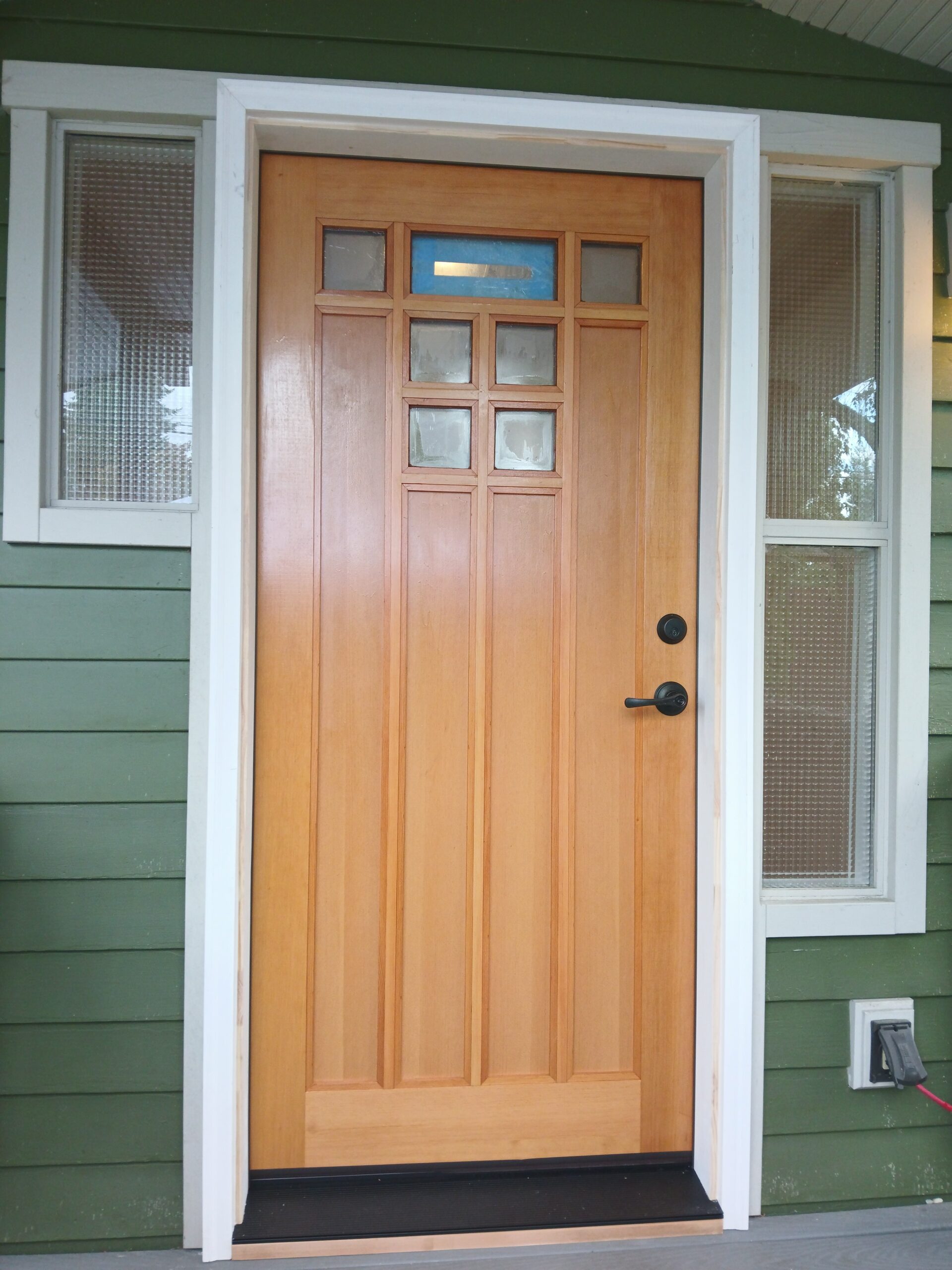 New wood exterior front door installed, Seattle home