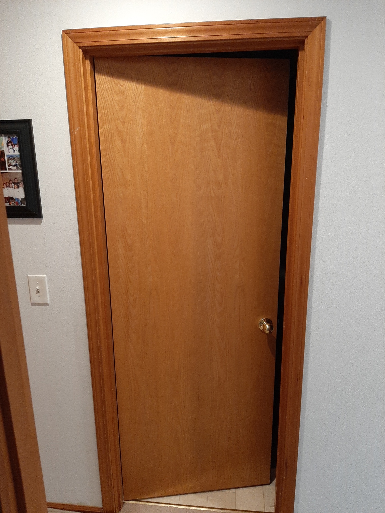 Wood interior door before installation, Seattle home