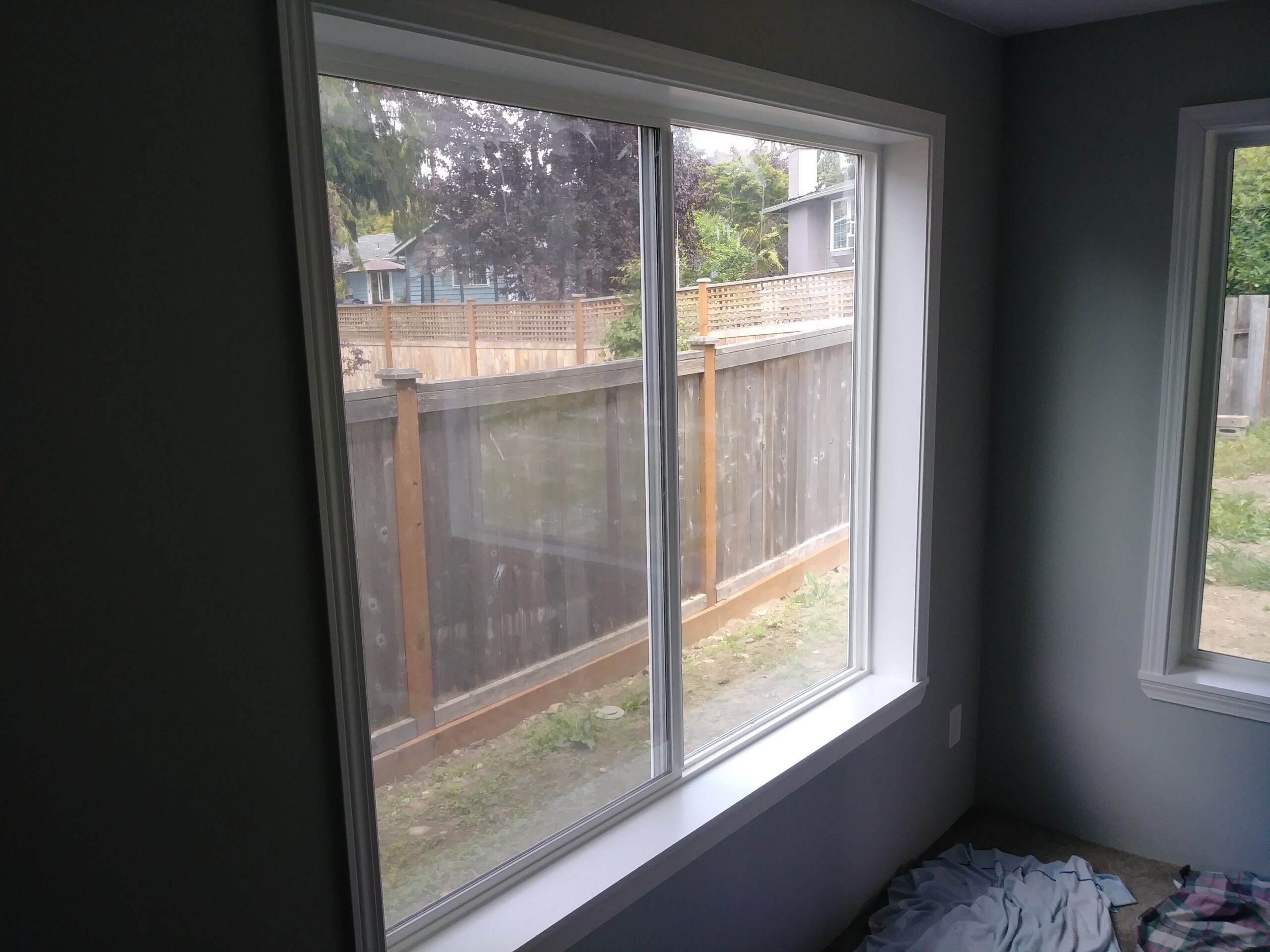 Finished window casing with dark accent wall, Seattle home