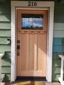 Wood craftsman exterior front door with glass insert installed, Seattle