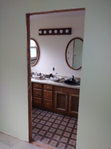 Bathroom before interior swing door installation, Seattle