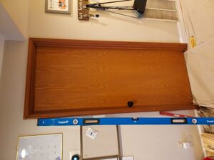 Interior room before wood swing door installation, Seattle