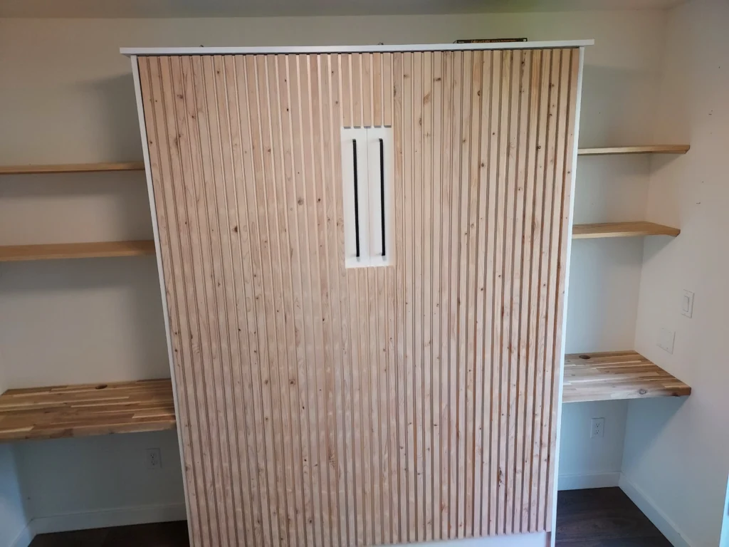 Finished natural wood vertical accent strips with floating shelves, Seattle