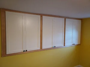 White custom built-in cabinet with sliding doors, Seattle bedroom