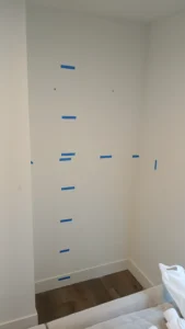 Empty wall before custom built-in cabinet installation, Seattle