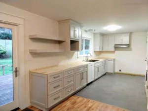 Completed white kitchen cabinet installation, Seattle remodel