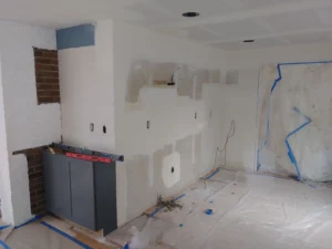 Kitchen before cabinet installation, rough framing stage, Seattle