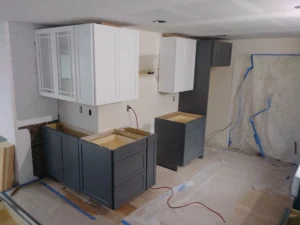 White upper kitchen cabinets installed during Seattle remodel