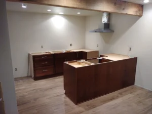 Dark wood custom built-in media center installed in Seattle living room