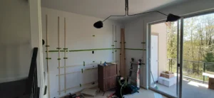 Bare wall before shadow box panel molding installation