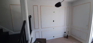 White shadow box molding installed on bedroom wall, Seattle