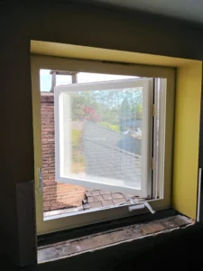 Window before interior casing and trim installation, Seattle