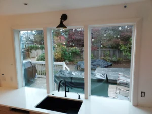 Kitchen window with trim installed, garden view, Seattle home