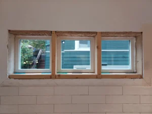 Triple horizontal window before interior trim installation, Seattle