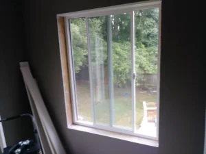 Window before interior trim installation, Seattle home