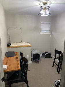 Room before custom built-in desk and cabinet installation, Seattle