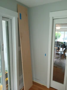 Empty wall space before custom built-in installation, Seattle home