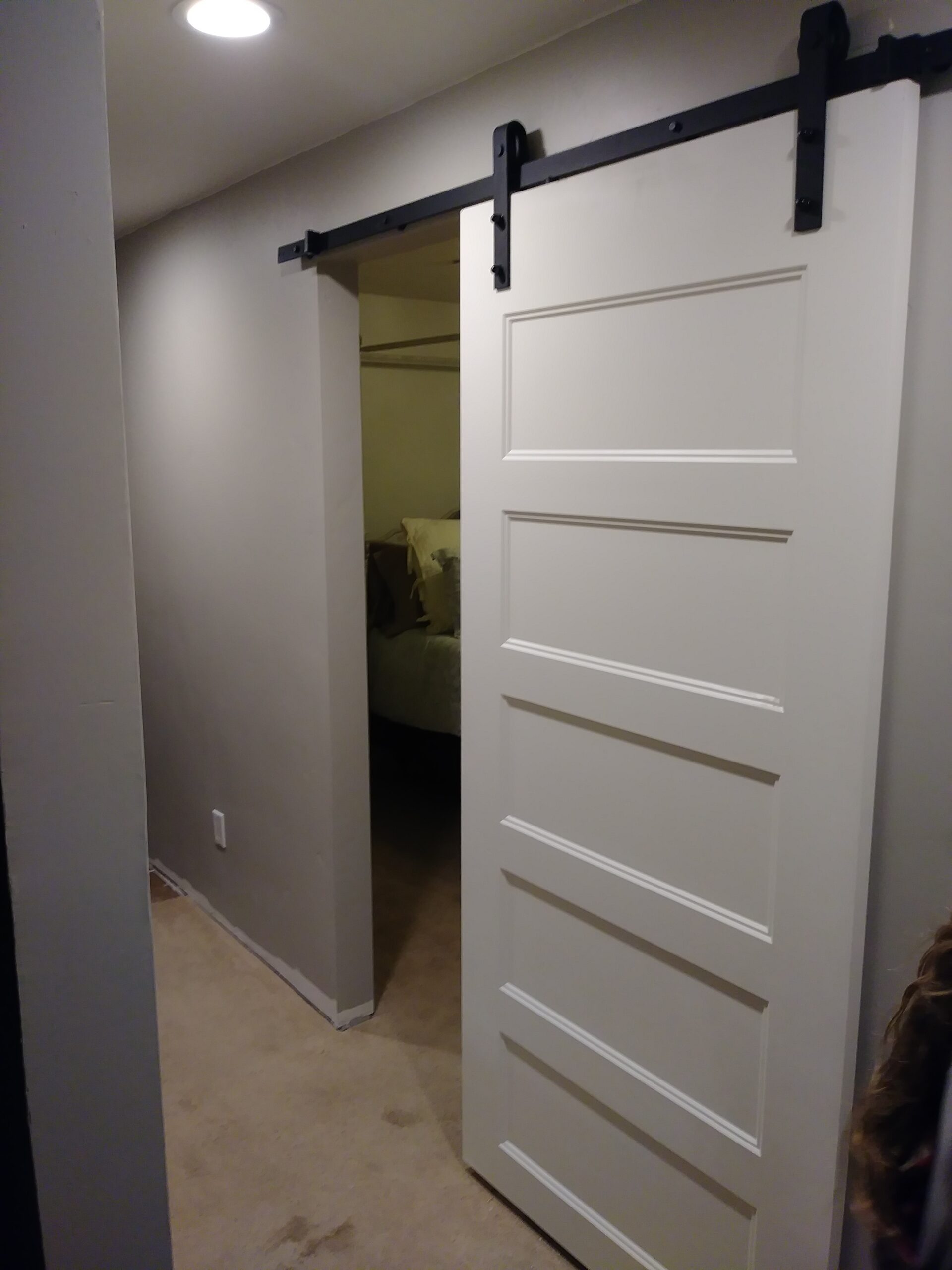 Sliding barn door installed in Seattle bedroom