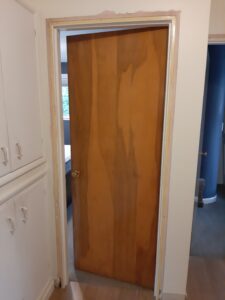 Interior swing door before installation, Seattle home