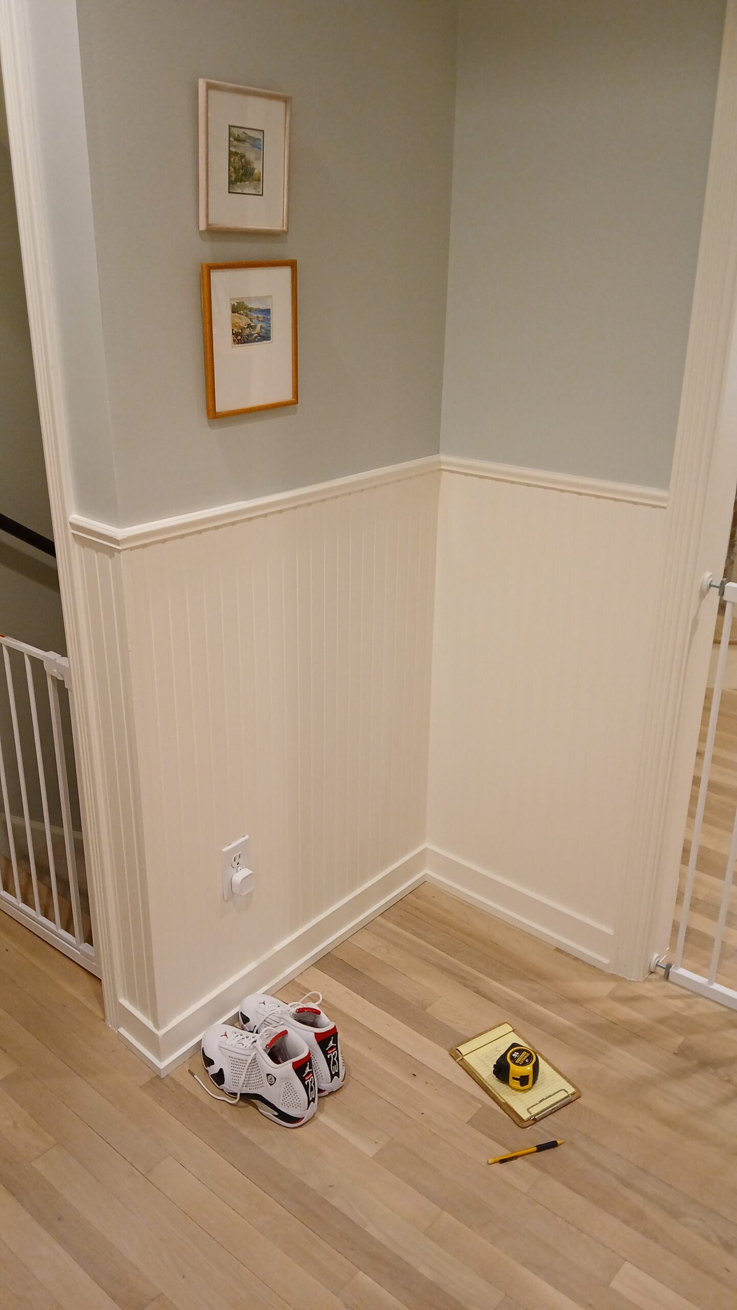 Empty mudroom corner before built-in bench installation, Seattle home