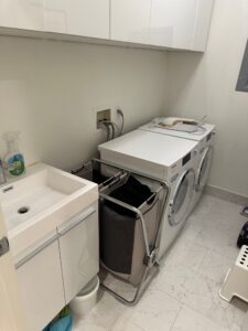 Laundry room before built-in cabinet installation, Seattle home