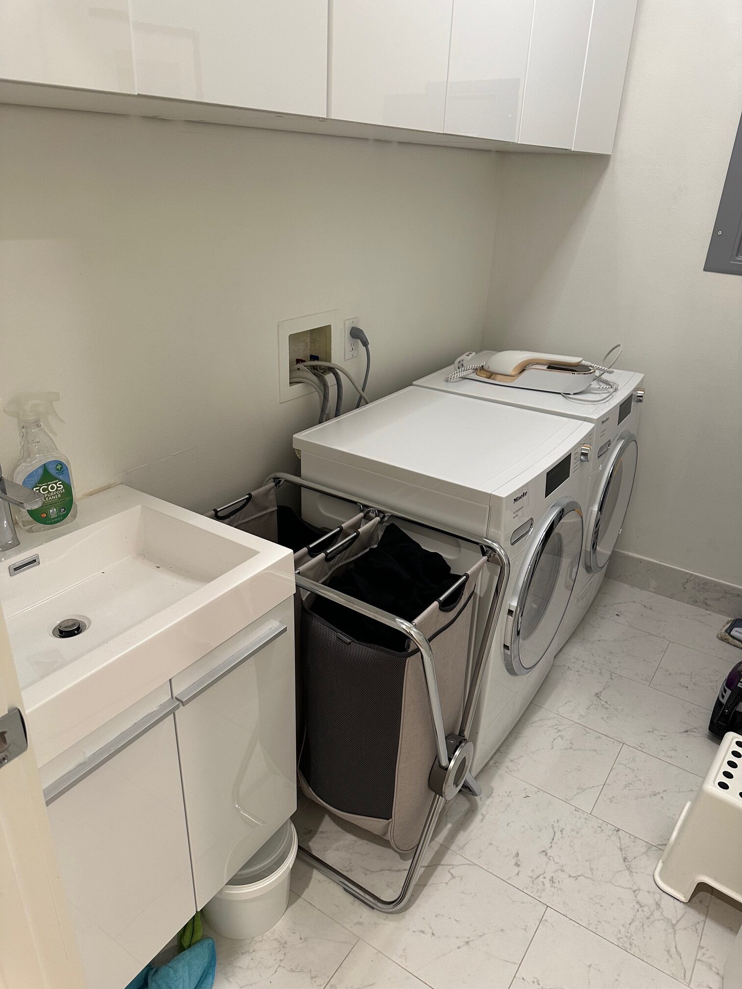 Laundry room before built-in cabinet installation, Seattle home