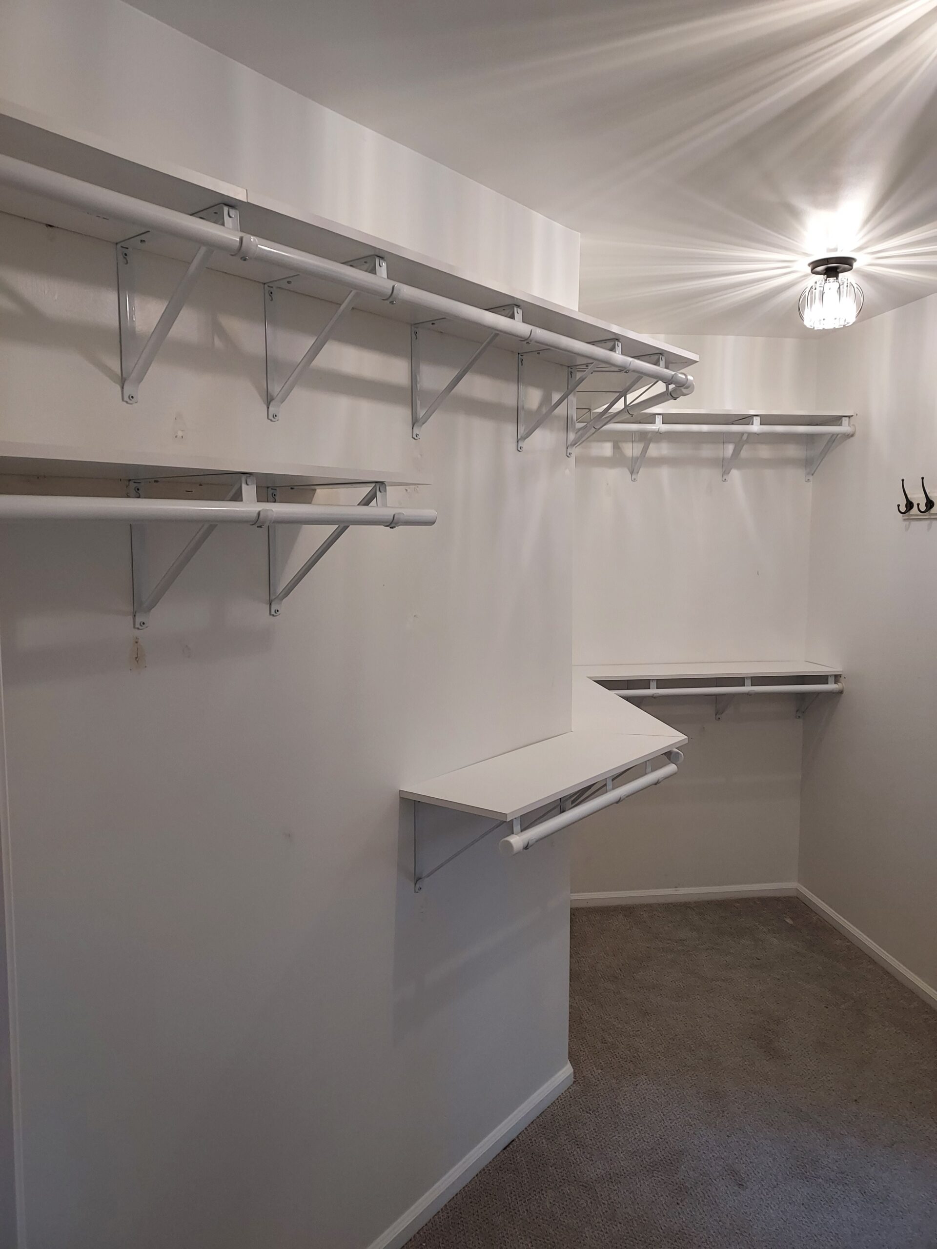 White wire closet shelving system installed in Seattle home