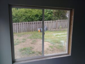 Large window before interior casing installation, Seattle
